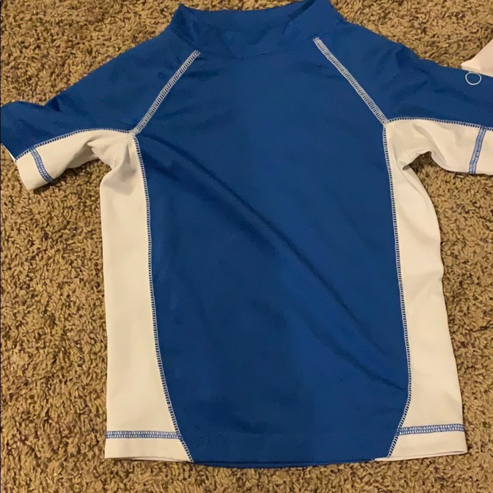 Never worn!! Boys swim shirt